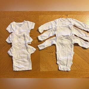Lot of 6 Newborn undershirts. Carter’s and Babies R Us